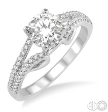 Load image into Gallery viewer, Express your eternal love to your love with this resplendent diamond Engagement Ring. Styled in Glinting 14 Karat White Gold, this ring is embellished with 48 sparkling round diamonds, prong set, accenting diamonds that flow down the split shank in brilliant rows. The ring showcases a .47 Carat round SI-1 I Diamond.  The Total Diamond Weight of the ring is .80 Carat