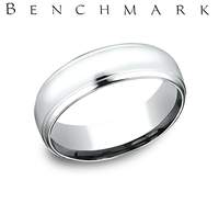 This 14KW Gold Men's Light Comfort Fit 6.5mm High Polished Band Features a Drop Edge. Finger Size 9  Total Weight 6.8 Grams