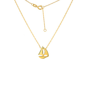14 karat yellow gold mini sailboat necklace.  the chain can be worn at 16" or 18"
