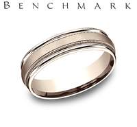 This 14 Karat White Gold Men's Light Comfort Fit 6.5mm Band Features a Satin Center Finish With Milgrain Edges and High Polish on the Outside Edge.  Finger Size 9  Total Weight 6.2 Grams