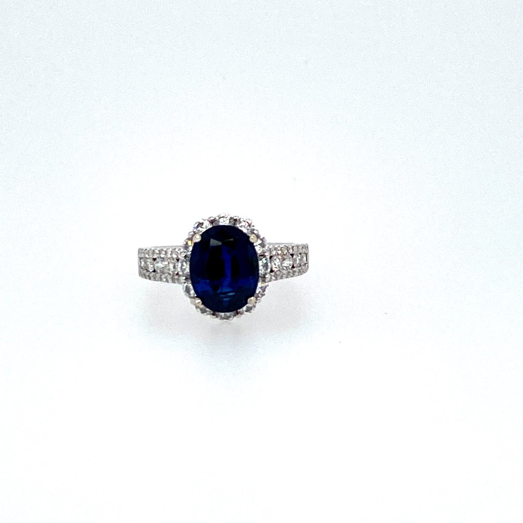 An Elegant Representation to this Natural No-Heat 2.87 Carat Sapphire (GIA Certificate) Gemstone. The Crown of the Sapphire is Brilliant Cut with the Pavilion being Step-Cut.  Set Around the Gemstone and Down the Sides of the Ring Mounting is a Total of 1.13 Carats of Sparkling White Diamonds  Finger Size 6 