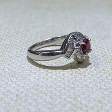 Load image into Gallery viewer, This Gorgeous Platinum Ruby and Diamond Estate Ring features a .45 carat Ruby gemstone, prong set in the center, with .15ctw of Baguette and Round Accent Diamonds. The total weight of the ring is 7.7 Grams  Finger size is 6  Weights are Approximate 
