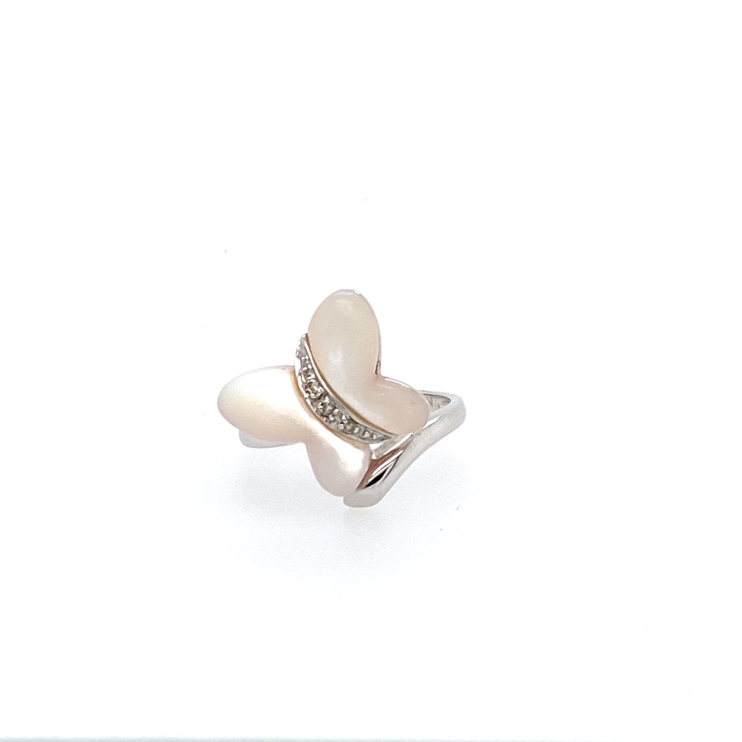 This Cute 14 Karat White Gold Dainty Butterfly Ring Features Mother of Pearl Shaped in a Butterfly with Accent Diamonds down the Center  Finger Size 6.5  Total Weight 3.4 Grams