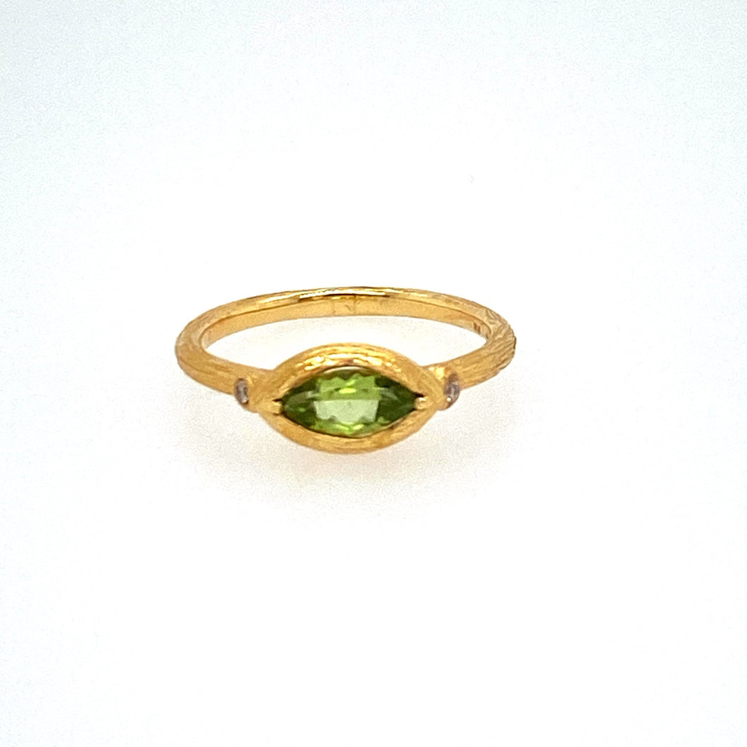 Loving the Way This Peridot is set Sideways into this 18 Karat Yellow gold (Brushed Finish) with an Accent Diamond on each Side  Finger Size 7