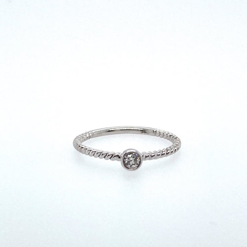 This Dainty 14 Karat White Gold Rope Style Ring Features a .09 Carat Bezel Set Round Diamond. Makes A Great Promise ring or an Addition to your Stackable rings. Finger Size 6.5  Total Weight 1.4 Grams