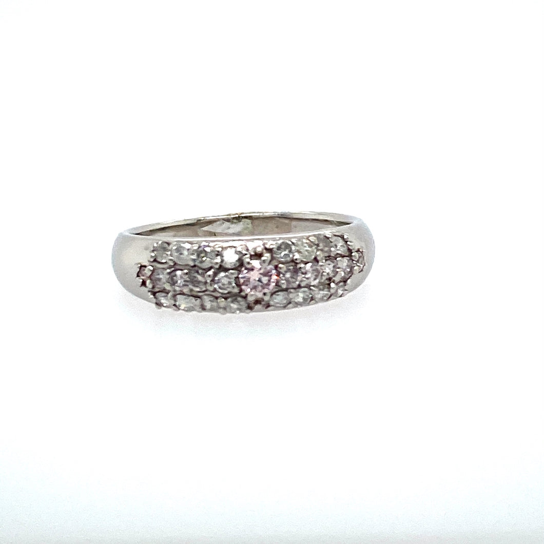 This Beautiful 4.6mm Platinum Ring Features Three Rows of Diamonds (Pink and White) with a Round Pink Diamond Set into the Center. Finger Size 7.5  Total Diamond Weight .52 Carat  Total Weight 6.2 Grams