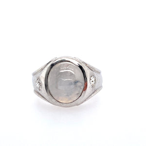 This Men's Estate Ring Features an Oval Gray Star Sapphire with a Burnish Set Diamond set on Both Sides of the Gemstone.   Finger Size 6.75  Total Weight 10.3 Grams Approximate Total Diamond Weight .32 Carat