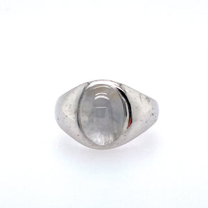This Men's 14 Karat White Gold Estate Ring Features an Oval Gray Star Sapphire.  Finger Size 9.25  Total Weight 10.4 Grams 