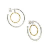 These Sterling Silver Hoop Earrings Designed by Frederic Duclos Feature a Yellow Gold Plated Ring inside of the Larger Sterling Silver Hoop. The Pair are Secured with Posts and Backs