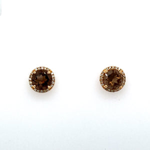 These Round Smokey Topaz Gemstones are set into a 14 Karat Yellow Gold 4 Prong Earring Setting with Posts and Push on Backs.  Total Gemstone Weight 2.5 Carats