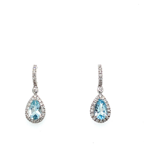 This Pair of 14 Karat White Gold Drop Earrings Feature a Pear Shaped Aquamarine Gemstone Embellished by a Diamond Halo. The Earrings are Secured with Posts and Push on Backs  Total Gemstone Weight 1.28 Carats