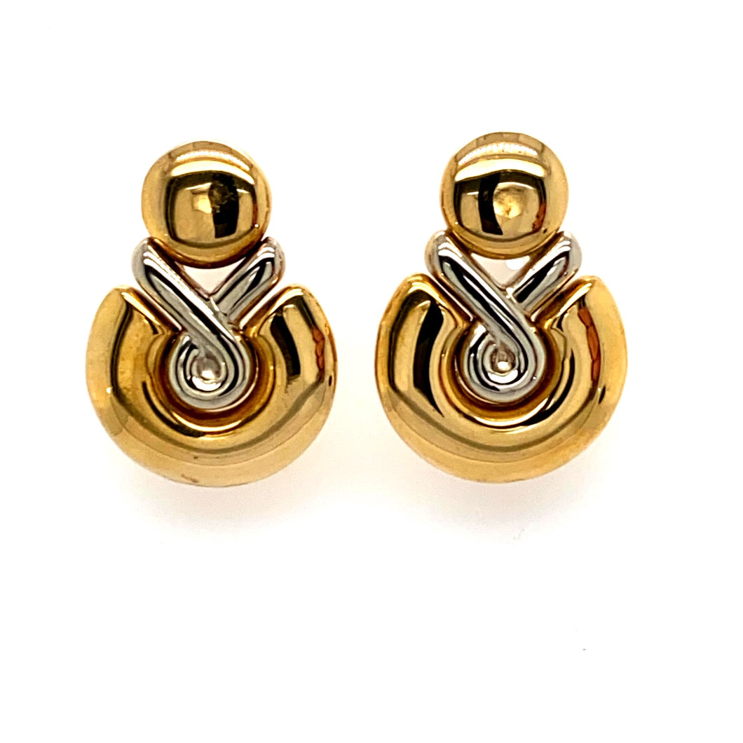 These Beautiful 18 Karat White Gold And Yellow Gold Omega Back Earrings from our Estate Collection have a Total Weight of 13.1 Grams           