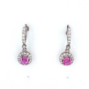 This Pair of Beautiful 18 Karat White Gold Drop Earrings Feature a Round Bright Pink Sapphire Gemstone with a Diamond Halo Dangling from the Bottom of the Earring with Diamonds Going up the Top of the Click in Back Earrings.  Total Gemstone Weight 1.27 Carats  Total Diamond Weight .92 Carat