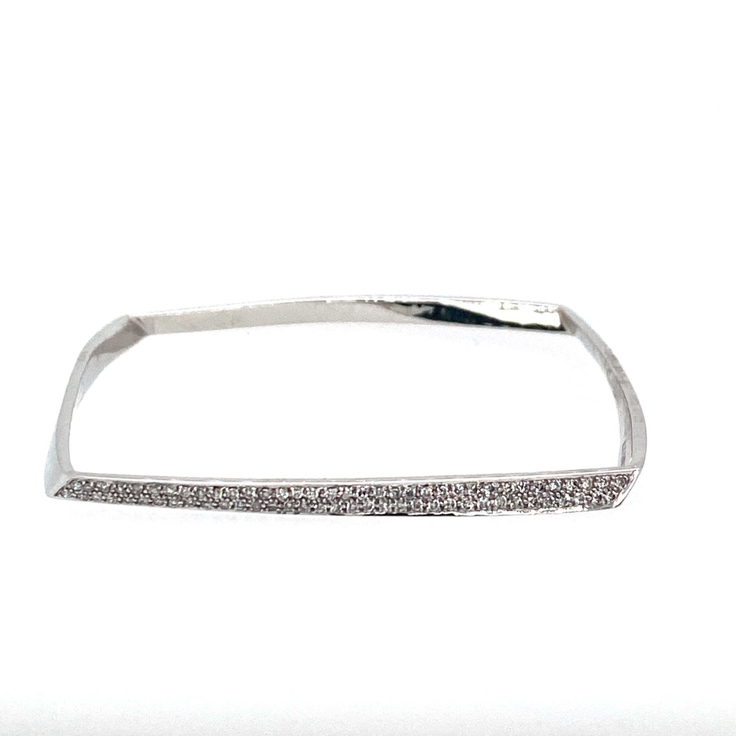 A Modern Twist to a Slip on Bangle, this 14 Karat White Gold Square Shaped Slip-on Bracelet is Pave set with .50dtw of Diamonds.  Total Weight is 17.4 Grams