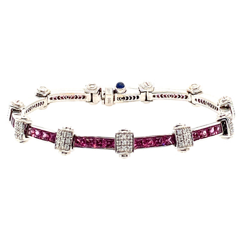 Pretty in Pink with this Estate Bracelet. This 18 Karat White Gold Charriol Flamme Blanche Bracelet Channels in 5.2ctw of Pink Sapphires and 2.97ctw of VS Diamonds. The Custom made Clasp includes a hidden safety.   Length is 7