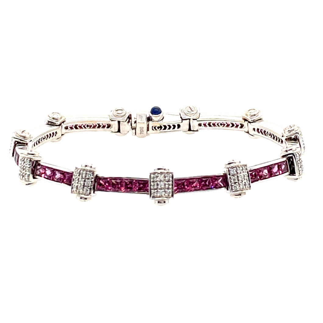 Pretty in Pink with this Estate Bracelet. This 18 Karat White Gold Charriol Flamme Blanche Bracelet Channels in 5.2ctw of Pink Sapphires and 2.97ctw of VS Diamonds. The Custom made Clasp includes a hidden safety.   Length is 7