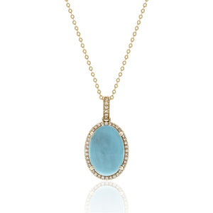 A favorite combination- turquoise and yellow gold! Featuring a 6.48 carat turquoise gemstone surrounded by .13 carats of diamonds in 14 karat yellow gold.  Chain is Adjustable to 18"