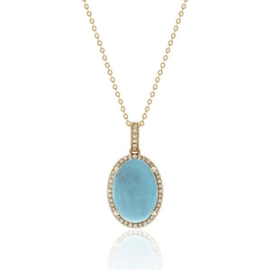 A favorite combination- turquoise and yellow gold! Featuring a 6.48 carat turquoise gemstone surrounded by .13 carats of diamonds in 14 karat yellow gold.  Chain is Adjustable to 18"