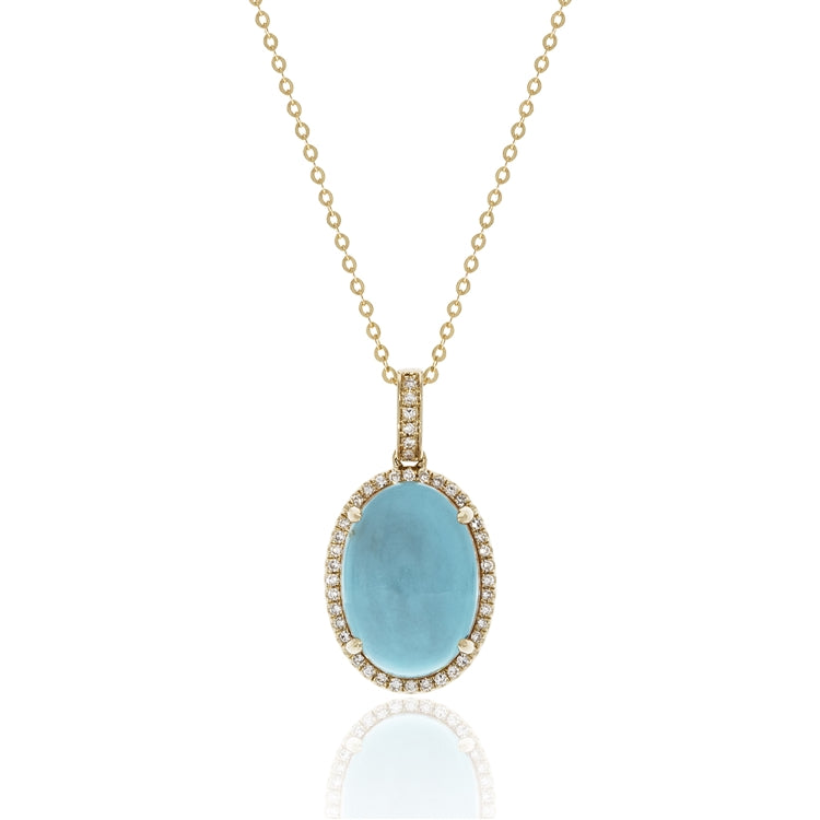 A favorite combination- turquoise and yellow gold! Featuring a 6.48 carat turquoise gemstone surrounded by .13 carats of diamonds in 14 karat yellow gold.  Chain is Adjustable to 18