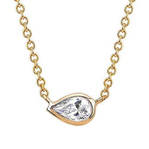 14 karat yellow gold bezel set .16 carat pear shaped diamond on a thin cable link chain. 17 1/2