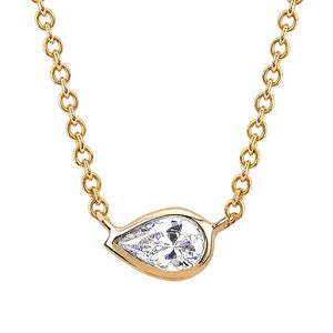 14 karat yellow gold bezel set .16 carat pear shaped diamond on a thin cable link chain. 17 1/2"