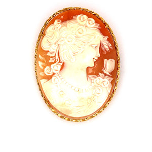 This Gorgeous Large Cameo of a Lady Estate Piece can Be Worn as a Pin or a Pendant. The Cameo is Set into a Oval Twisted Design Mounting. Measures Approximately 62.0mm x 47.0mm  Total Weight 19.5 Grams. Made in 18 Karat Yellow Gold