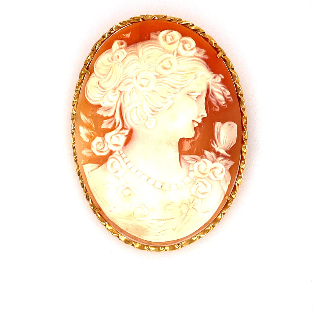 This Gorgeous Large Cameo of a Lady Estate Piece can Be Worn as a Pin or a Pendant. The Cameo is Set into a Oval Twisted Design Mounting. Measures Approximately 62.0mm x 47.0mm  Total Weight 19.5 Grams. Made in 18 Karat Yellow Gold