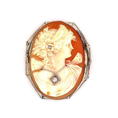 This Estate 14 Karat White Textured Gold Octagon Shaped Pin/Pendant Mounting Features an Oval Cameo of a Lady. The Lady Features a Diamond Necklace and a Diamond Near the Ear. Measures Approximately 46.0mm x 56.0mm  6 Total European-Cut Diamonds (5 in Necklace, 1 in ear area)  Total Weight 18.1 Grams