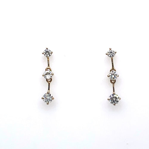 These 14 Karat White Gold Estate 3 Diamond Drop Earrings are Secured with Posts and Push on Backs.  Approximate Total Diamond Weight 1.00 Carat