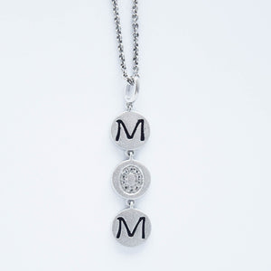 mommy chic "mom" drop necklace in sterling silver and can be worn at 18" or 20"