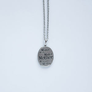 mommy chic sterling silver oval shaped multi lingual "mother" necklace.  can be worn at 18" or 20"