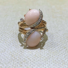 Load image into Gallery viewer, Estate 14 Karat Yellow Gold Two Coral Cabochon-Cut ring with an added touch of accent diamonds to this freeform ring. Finger Size is 7.5. Total Weight is 12.3 Grams
