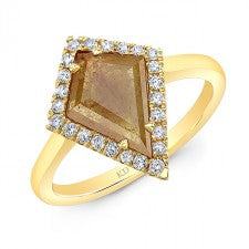 14 Karat Yellow Gold Kite shaped Rough Diamond ring with a white faceted diamond halo. the center rough diamond is .42 Carat and the total weight of the white diamonds is .12 carat. Finger size is 6.5