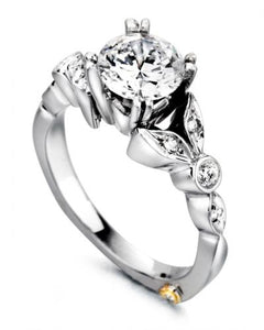 14 Karat White gold "Reminiscent" engagement ring designed by Mark Schneider, contains 9 diamonds totaling  .155 Carat.  The Center stone is sold separately, not included in price.  the finger size is 6.5 